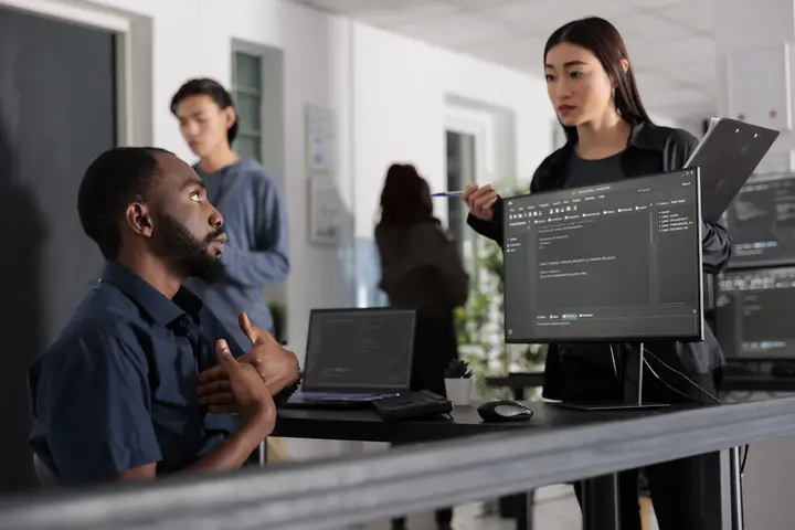 Customer Service Manager discussing with customer.